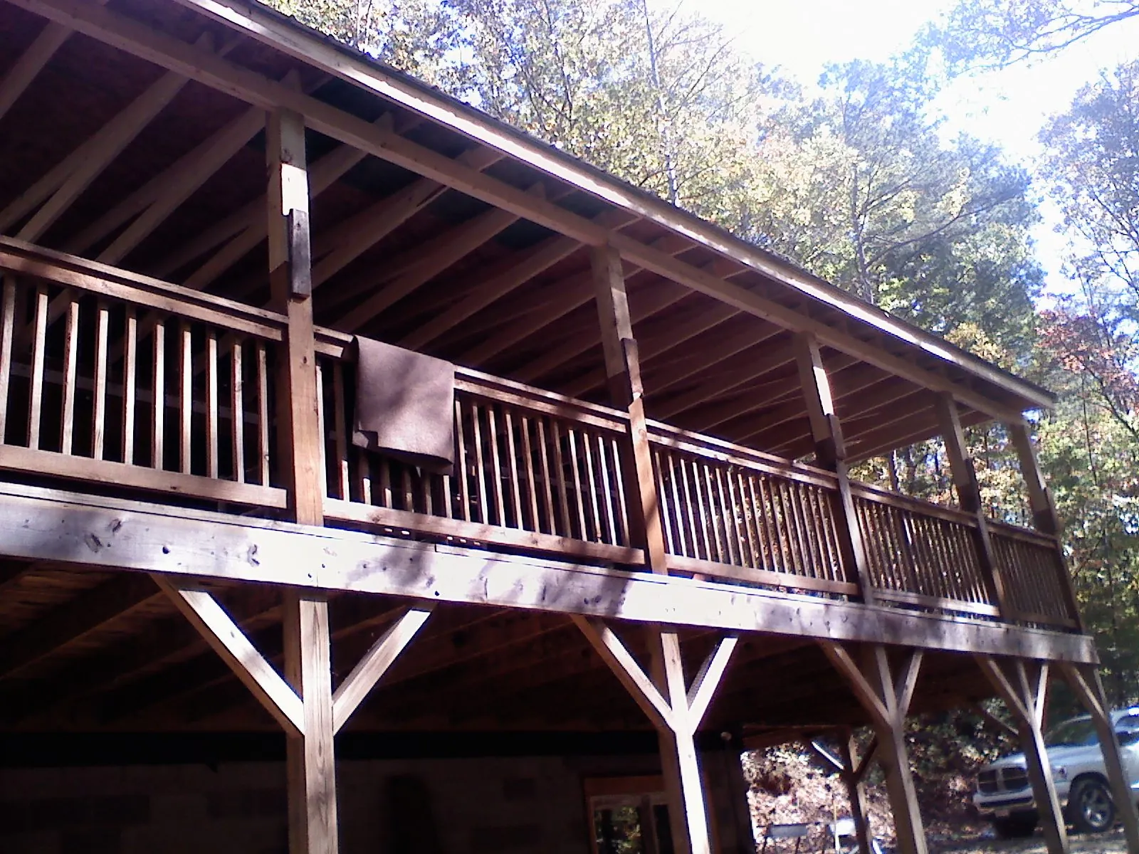 Timber framing under a new elevated porch and deck — Roof Leak Repair in Winder by Roofing Brothers